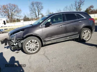 2017 Cadillac XT5 Premium Luxury FWD z VIN 1GYKNCRS2HZ114664, wystawiony jako Copart lot #84624944 z przebiegiem 153 882 mil mil oraz Szkody całkowita. Historia ofert i sprzedaży dostępna na DreamBid. Obrazek 1.