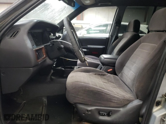 1998 Jeep Grand Cherokee Laredo with VIN 1J4GZ48S3WC269693, listed as a Copart auction lot 85026074 with 308,791 mi miles and Salvage Title. Bid and sale history available at carsss.com. Image 7.