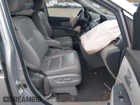 2013 Honda Odyssey EX-L with VIN 5FNRL5H65DB050789, listed as a IAAI auction lot 41911537 with 160,348 mi miles and . Bid and sale history available at carsss.com. Image 5.