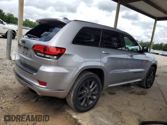 2018 Jeep Grand Cherokee High Altitude with VIN 1C4RJFCT8JC344110, listed as a Copart auction lot 60257065 with 94,917 mi miles and Salvage title. Bid and sale history available at DreamBid. Image 3.