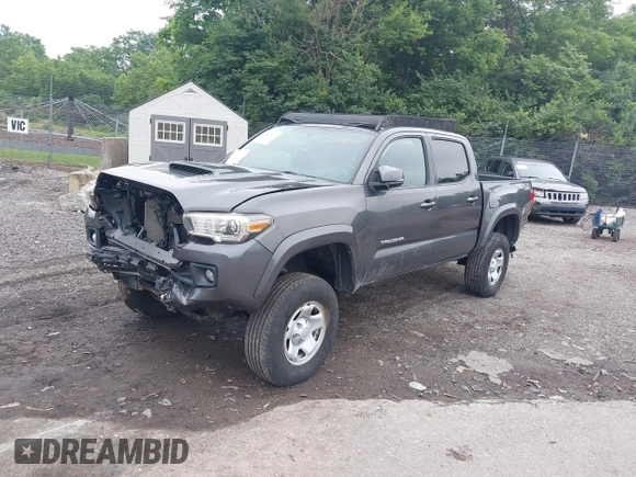 2017 Toyota Tacoma SR5 with VIN 3TMCZ5ANXHM089093, listed as a IAAI auction lot 42513711 with 86,022 mi miles and . Bid and sale history available at DreamBid. Image 18.