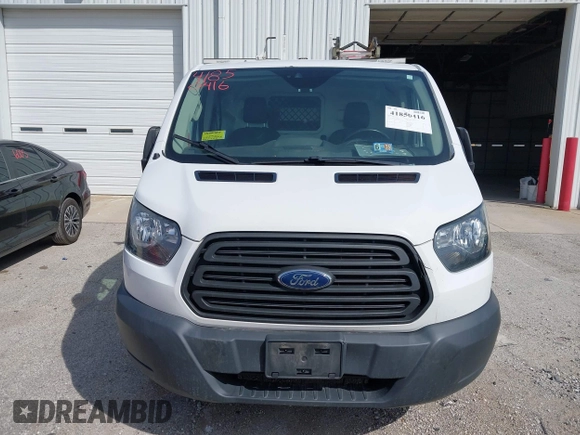 2016 Ford Transit Cargo z VIN 1FTYR1YM1GKB55452, wystawiony jako IAAI lot #41850416 z przebiegiem 91 973 mil mil oraz . Historia ofert i sprzedaży dostępna na DreamBid. Obrazek 12.