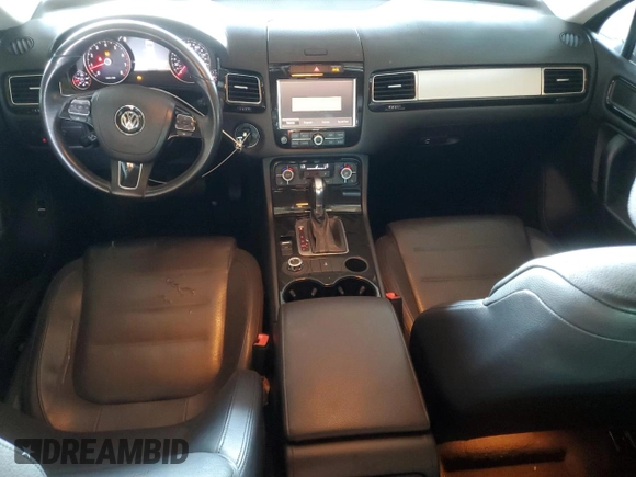 2013 Volkswagen Touareg Lux с VIN WVGEF9BP9DD003735, выставлен на аукционе Copart как лот 58852315 с пробегом 138 223 миль миль и Списание • Salvage title. История ставок и продаж доступна на DreamBid. Изображение 8.
