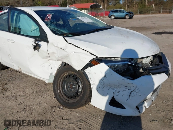 2019 Toyota Corolla L with VIN 5YFBURHEXKP934032, listed as a IAAI auction lot 41247557 with 95,560 mi miles. Bid and sale history available at carsss.com. Image 6.
