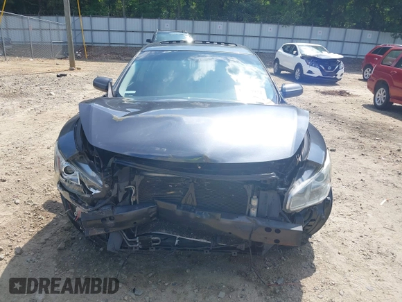 2013 Nissan Maxima SV with VIN 1N4AA5AP7DC805658, listed as a IAAI auction lot 42453972 with 198,641 mi miles and . Bid and sale history available at DreamBid. Image 12.