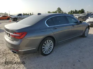 2018 BMW 7 Series 740i with VIN WBA7E2C56JG741634, listed as a Copart auction lot 61530123 with 82,207 mi miles. Bid and sale history available at carsss.com. Image 3.