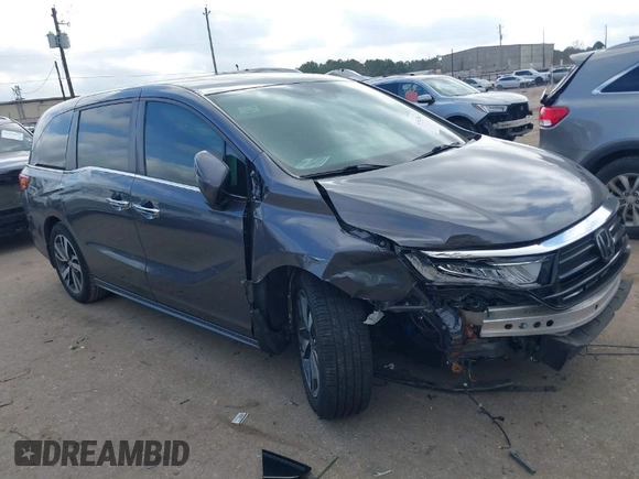 2022 Honda Odyssey Touring with VIN 5FNRL6H80NB023623, listed as a IAAI auction lot 41512586 with 63,329 mi miles and . Bid and sale history available at DreamBid. Image 1.