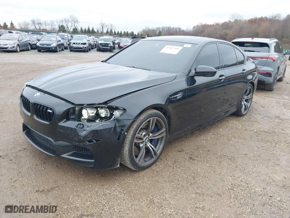 2013 BMW M5 with VIN WBSFV9C51DD095750, listed as a IAAI auction lot 40907304 with 93,014 mi miles. Bid and sale history available at carsss.com. Image 18.