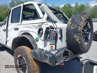 2020 Jeep Wrangler Unlimited Rubicon z VIN 1C4JJXFM5LW278740, wystawiony jako IAAI lot #42086112 z przebiegiem 93 658 mil mil oraz . Historia ofert i sprzedaży dostępna na DreamBid. Obrazek 13.