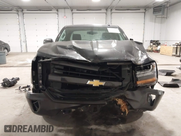 2016 Chevrolet Silverado 1500 LT with VIN 1GCVKREC0GZ303387, listed as a IAAI auction lot 41978237 with 123,692 mi miles and . Bid and sale history available at DreamBid. Image 12.