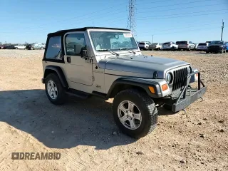 2001 Jeep Wrangler SE with VIN 1J4FA29P11P334902, listed as a Copart auction lot 83883654 with 157,827 mi miles and Salvage Title. Bid and sale history available at carsss.com. Image 11.