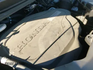 2020 Honda Pilot Touring 7-Passenger z VIN 5FNYF5H65LB006048, wystawiony jako IAAI lot #41294635 z przebiegiem 32 429 mil mil oraz . Historia ofert i sprzedaży dostępna na DreamBid. Obrazek 21.