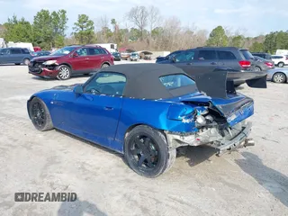 2002 Honda S2000 z VIN JHMAP11452T009221, wystawiony jako IAAI lot #38811161 z przebiegiem 67 818 mil mil oraz . Historia ofert i sprzedaży dostępna na DreamBid. Obrazek 3.