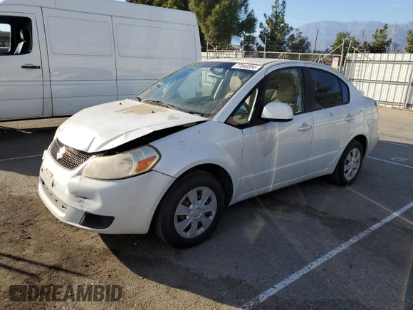 2011 Suzuki SX4 LE with VIN JS2YC5A21B6300207, listed as a Copart auction lot 77040354 with 162,915 mi miles and Salvage Title. Bid and sale history available at carsss.com. Image 1.