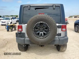 2015 Jeep Wrangler Unlimited Rubicon z VIN 1C4BJWFG0FL529310, wystawiony jako Copart lot #64337405 z przebiegiem Nie podano mil oraz Szkoda całkowita • Salvage title. Historia ofert i sprzedaży dostępna na DreamBid. Obrazek 6.