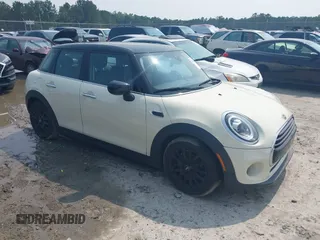 2020 MINI Hardtop 4 Door Cooper with VIN WMWXU7C01L2M54710, listed as a IAAI auction lot 42385956 with 55,714 mi miles and . Bid and sale history available at DreamBid. Image 1.