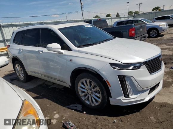 2020 Cadillac XT6 FWD Premium Luxury with VIN 1GYKPCRS1LZ232773, listed as a Copart auction lot 61201565 with 15,866 mi miles and Salvage title. Bid and sale history available at DreamBid. Image 4.