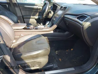 2016 Ford Fusion Titanium with VIN 3FA6P0K90GR188049, listed as a IAAI auction lot 42575477 with 239,414 mi miles and . Bid and sale history available at DreamBid. Image 5.