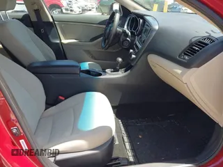 2014 Kia Optima LX with VIN 5XXGM4A75EG329546, listed as a IAAI auction lot 42159226 with 200,963 mi miles. Bid and sale history available at carsss.com. Image 5.