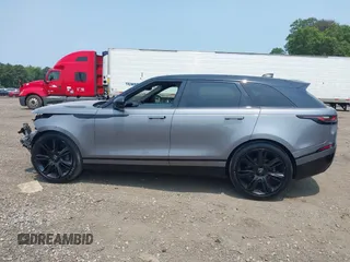 2020 Land Rover Range Rover Velar z VIN SALYM2EV8LA274870, wystawiony jako IAAI lot #42479938 z przebiegiem 43 039 mil mil oraz . Historia ofert i sprzedaży dostępna na DreamBid. Obrazek 14.