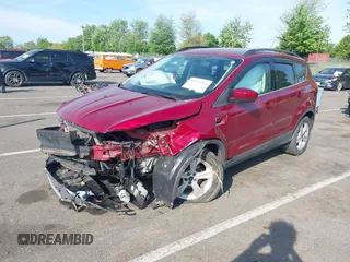 2014 Ford Escape SE z VIN 1FMCU0GX2EUB91517, wystawiony jako IAAI lot #42231093 z przebiegiem 67 436 mil mil oraz . Historia ofert i sprzedaży dostępna na DreamBid. Obrazek 2.