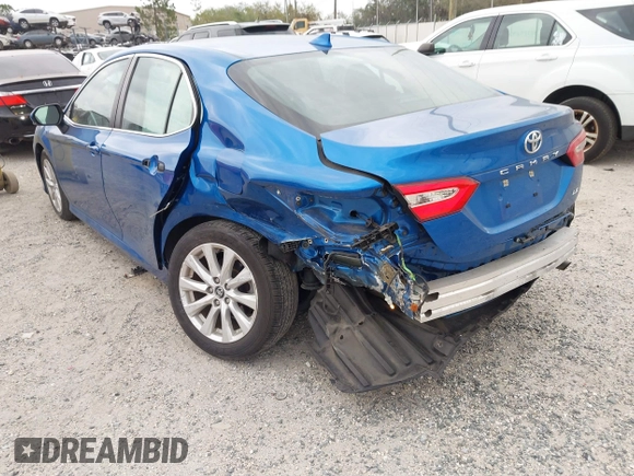 2020 Toyota Camry LE with VIN 4T1L11AK5LU310671, listed as a IAAI auction lot 41732306 with 61,379 mi miles and . Bid and sale history available at carsss.com. Image 6.