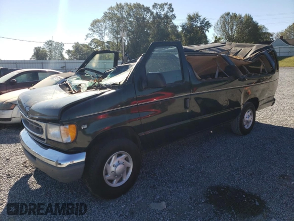 1999 Ford Econoline Passenger XL with VIN 1FBSS31L0XHB12679, listed as a Copart auction lot 74257504 with 136,821 mi miles and Salvage Title. Bid and sale history available at DreamBid. Image 1.