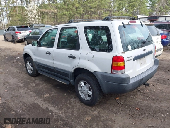 2003 Ford Escape XLS Popular with VIN 1FMYU021X3KC76123, listed as a IAAI auction lot 41844824 with 185,036 mi miles and . Bid and sale history available at DreamBid. Image 3.
