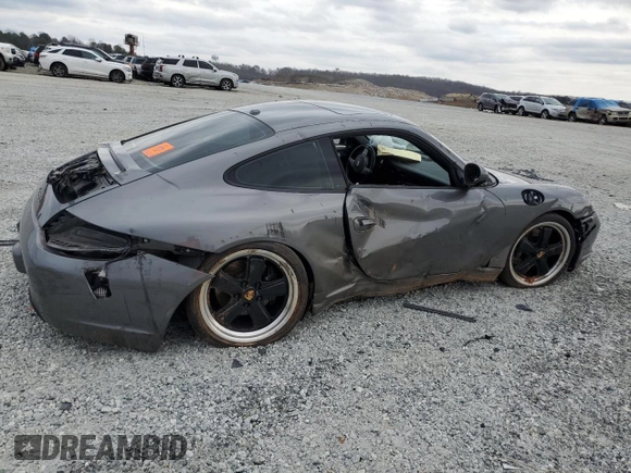 2010 Porsche 911 Carrera with VIN WP0AA2A99AS706111, listed as a Copart auction lot 44523405 with Not Provided miles and Salvage Title. Bid and sale history available at DreamBid. Image 3.