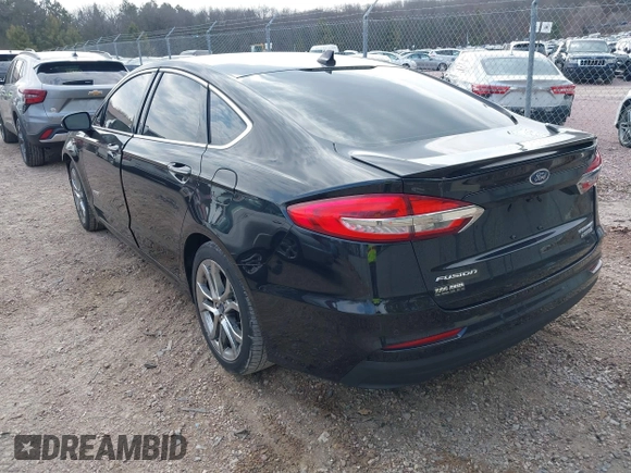 2019 Ford Fusion Hybrid Titanium with VIN 3FA6P0RU4KR144445, listed as a IAAI auction lot 42059840 with 90,617 mi miles. Bid and sale history available at carsss.com. Image 3.