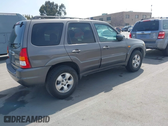 2003 Mazda Tribute LX with VIN 4F2YZ04193KM08890, listed as a IAAI auction lot 42158385 with 282,314 mi miles and . Bid and sale history available at carsss.com. Image 4.