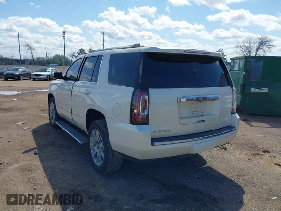 2015 GMC Yukon Denali with VIN 1GKS1CKJ5FR285199, listed as a IAAI auction lot 41763187 with 135,265 mi miles. Bid and sale history available at carsss.com. Image 3.