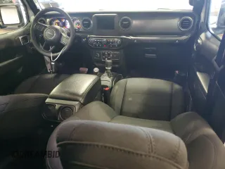 2023 Jeep Wrangler Sport z VIN 1C4HJXDG1PW619939, wystawiony jako Copart lot #51923345 z przebiegiem 24 204 mil mil oraz Szkoda całkowita • Salvage title. Historia ofert i sprzedaży dostępna na DreamBid. Obrazek 8.