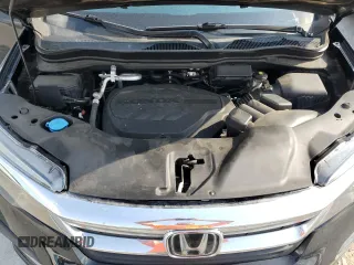 2021 Honda Pilot EX-L z VIN 5FNYF5H54MB038661, wystawiony jako Copart lot #55385035 z przebiegiem 56 686 mil mil oraz Szkoda całkowita • Salvage title. Historia ofert i sprzedaży dostępna na DreamBid. Obrazek 12.