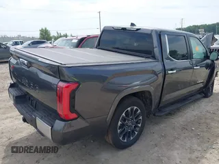 2025 Toyota Tundra Limited with VIN 5TFJA5DB2SX257293, listed as a IAAI auction lot 42742408 with 7,629 mi miles and . Bid and sale history available at DreamBid. Image 4.