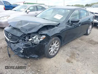 2016 Mazda 6 i Sport with VIN JM1GJ1U55G1461951, listed as a IAAI auction lot 41790268 with 98,567 mi miles and . Bid and sale history available at DreamBid. Image 2.