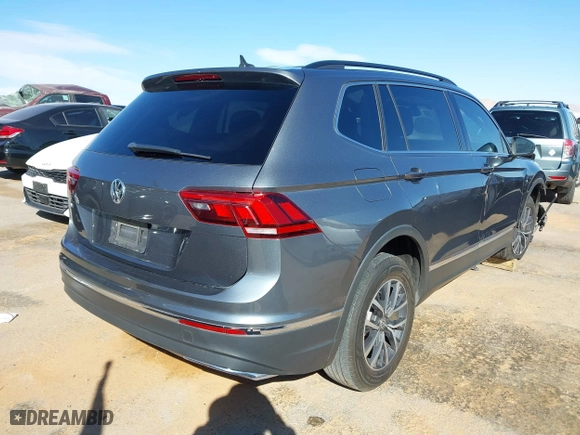 2020 Volkswagen Tiguan SE with VIN 3VV3B7AX6LM017819, listed as a IAAI auction lot 41612776 with 74,576 mi miles. Bid and sale history available at carsss.com. Image 4.