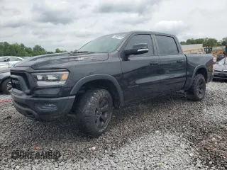 2020 Ram 1500 Rebel with VIN 1C6SRFLT5LN408810, listed as a Copart auction lot 56894725 with 49,089 mi miles and Salvage title. Bid and sale history available at DreamBid. Image 1.