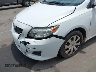 2009 Toyota Corolla with VIN 2T1BU40E59C104664, listed as a IAAI auction lot 42492948 with 188,933 mi miles and . Bid and sale history available at DreamBid. Image 12.