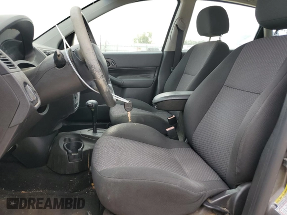 2007 Ford Focus S with VIN 1FAHP37N07W331532, listed as a Copart auction lot 71894104 with 183,909 mi miles and Clean Title. Bid and sale history available at carsss.com. Image 7.