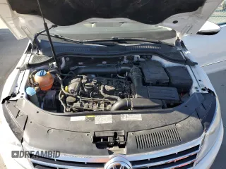 2014 Volkswagen CC R-Line с VIN WVWBP7AN8EE502398, выставлен на аукционе Copart как лот 52826405 с пробегом 121 799 миль миль и Списание • Salvage title. История ставок и продаж доступна на DreamBid. Изображение 11.