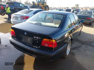 2000 BMW 5 Series 528iA with VIN WBADM6343YGU12629, listed as a IAAI auction lot 41963814 with 206,922 mi miles. Bid and sale history available at carsss.com. Image 4.
