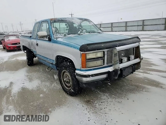 1992 GMC Sierra 2500 z VIN 2GTFK29K3N1539843, wystawiony jako Copart lot #45037335 z przebiegiem 146 355 mil mil oraz Szkody całkowita. Historia ofert i sprzedaży dostępna na DreamBid. Obrazek 11.