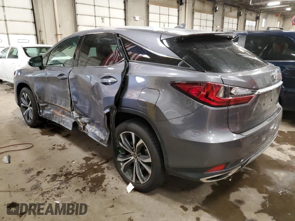 2022 Lexus RX with VIN 2T2HZMDA2NC323851, listed as a Copart auction lot 70025382 with 26,613 mi miles. Bid and sale history available at carsss.com. Image 2.