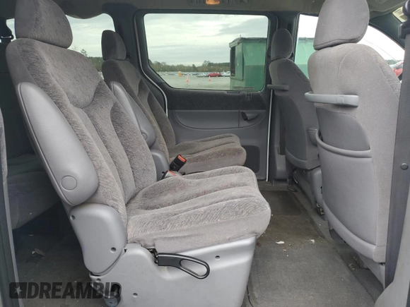 1999 Plymouth Voyager Grand SE z VIN 1P4GP44G7XB831207, wystawiony jako Copart lot #79558714 z przebiegiem 163 620 mil mil oraz Szkody całkowita. Historia ofert i sprzedaży dostępna na DreamBid. Obrazek 11.