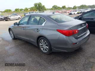 2014 Infiniti Q50 Sport with VIN JN1BV7AR5EM700230, listed as a IAAI auction lot 42445133 with 195,055 mi miles and . Bid and sale history available at DreamBid. Image 3.