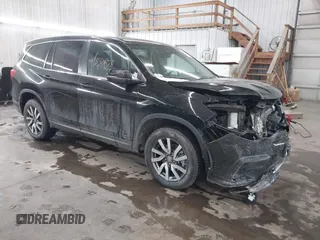 2021 Honda Pilot EX-L with VIN 5FNYF6H50MB092898, listed as a IAAI auction lot 41530673 with 28,505 mi miles. Bid and sale history available at carsss.com. Image 1.