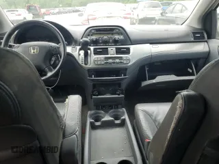 2006 Honda Odyssey Touring z VIN 5FNRL38886B000011, wystawiony jako Copart lot #57399225 z przebiegiem 256 217 mil mil oraz Szkoda całkowita • Salvage title. Historia ofert i sprzedaży dostępna na DreamBid. Obrazek 8.