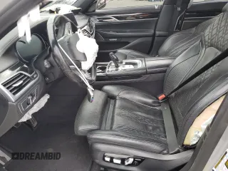 2018 BMW 7 Series 740i with VIN WBA7E2C53JG742711, listed as a Copart auction lot 51643505 with 0 mi miles and Salvage Title. Bid and sale history available at carsss.com. Image 7.