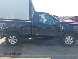 2021 Ford F-150 XL z VIN 1FTMF1E5XMKE72999, wystawiony jako IAAI lot #41790862 z przebiegiem 55 991 mil mil oraz . Historia ofert i sprzedaży dostępna na DreamBid. Obrazek 13.